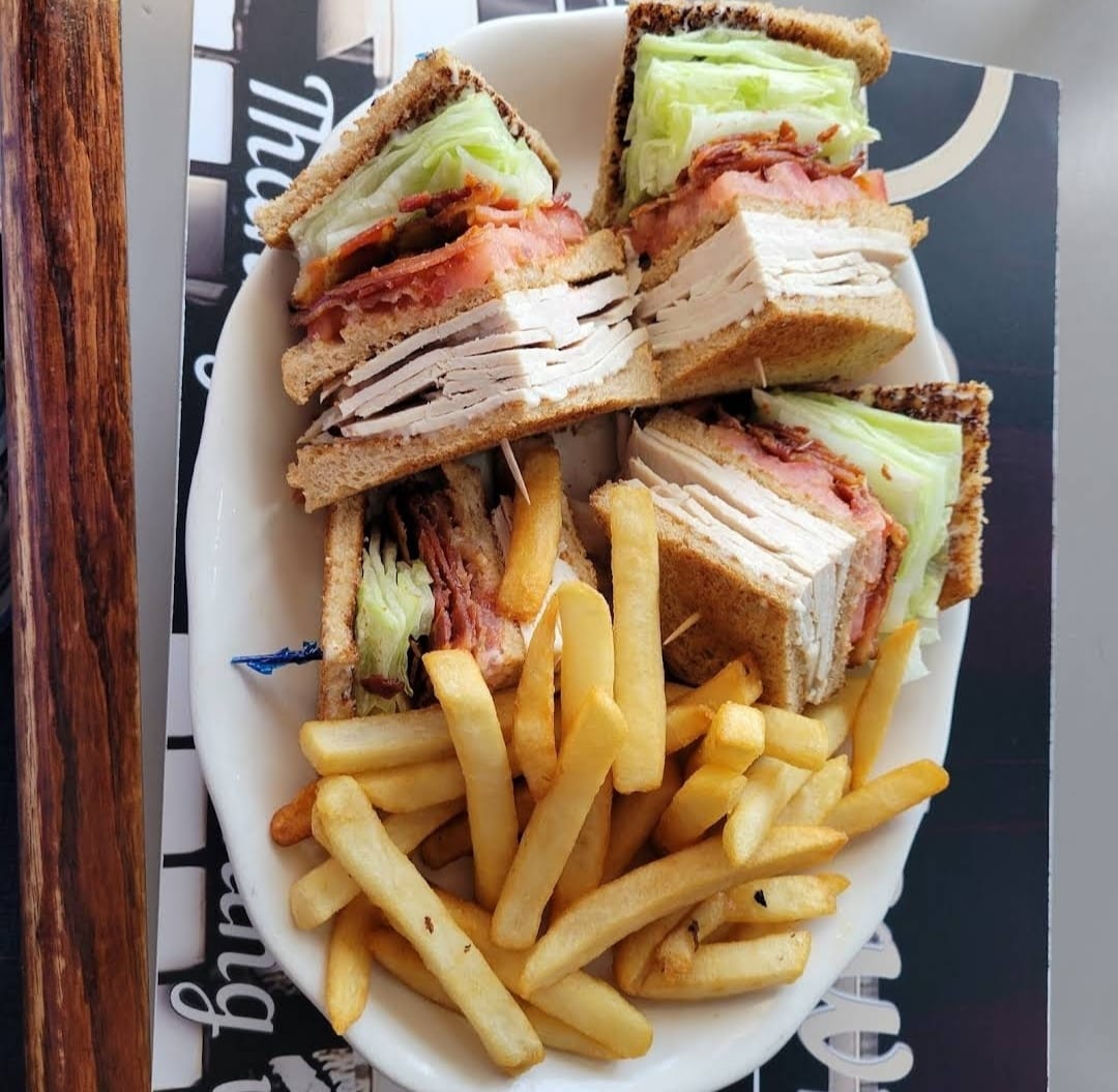 Club Sandwich with Fries at Crosstown Diner